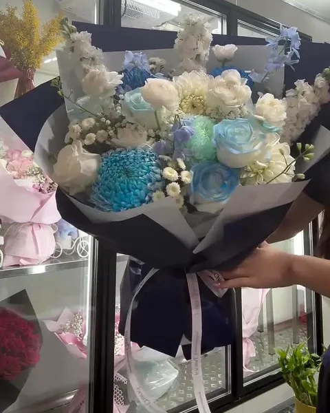 Blue roses with white flowers